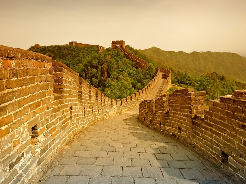 A view down a walled pathway.