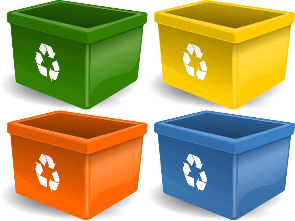 Four idderent coloured boxes each with the recycling logo.