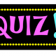 A black rectangle with the word Quiz written inside in bright pink